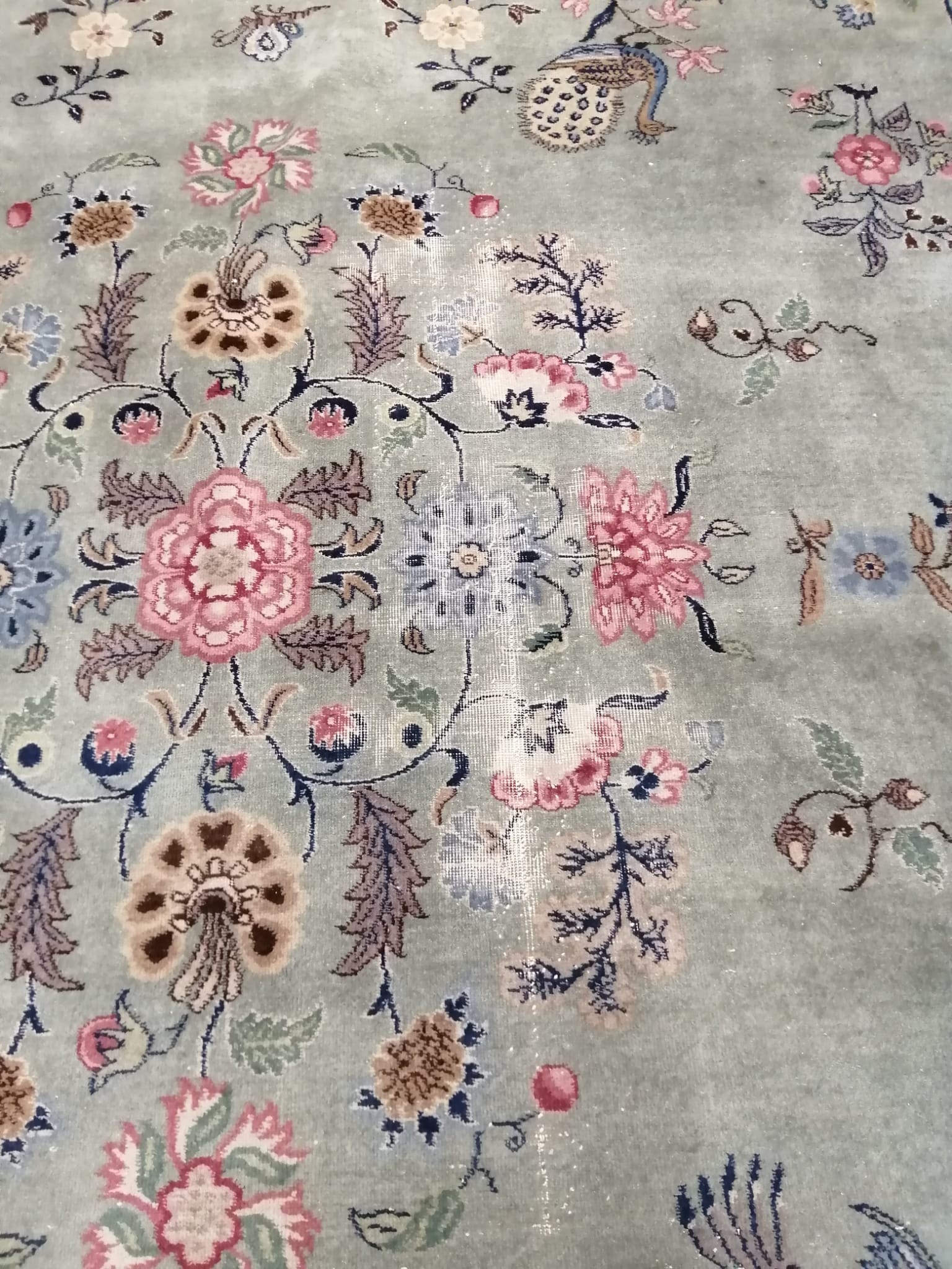 A Chinese Celadon ground floral blue ground carpet, approx. 544 x 366cm